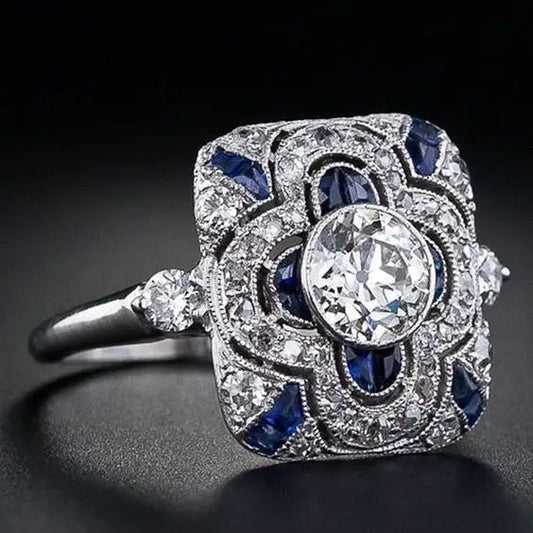 Bague classique en argent avec zircone bleue