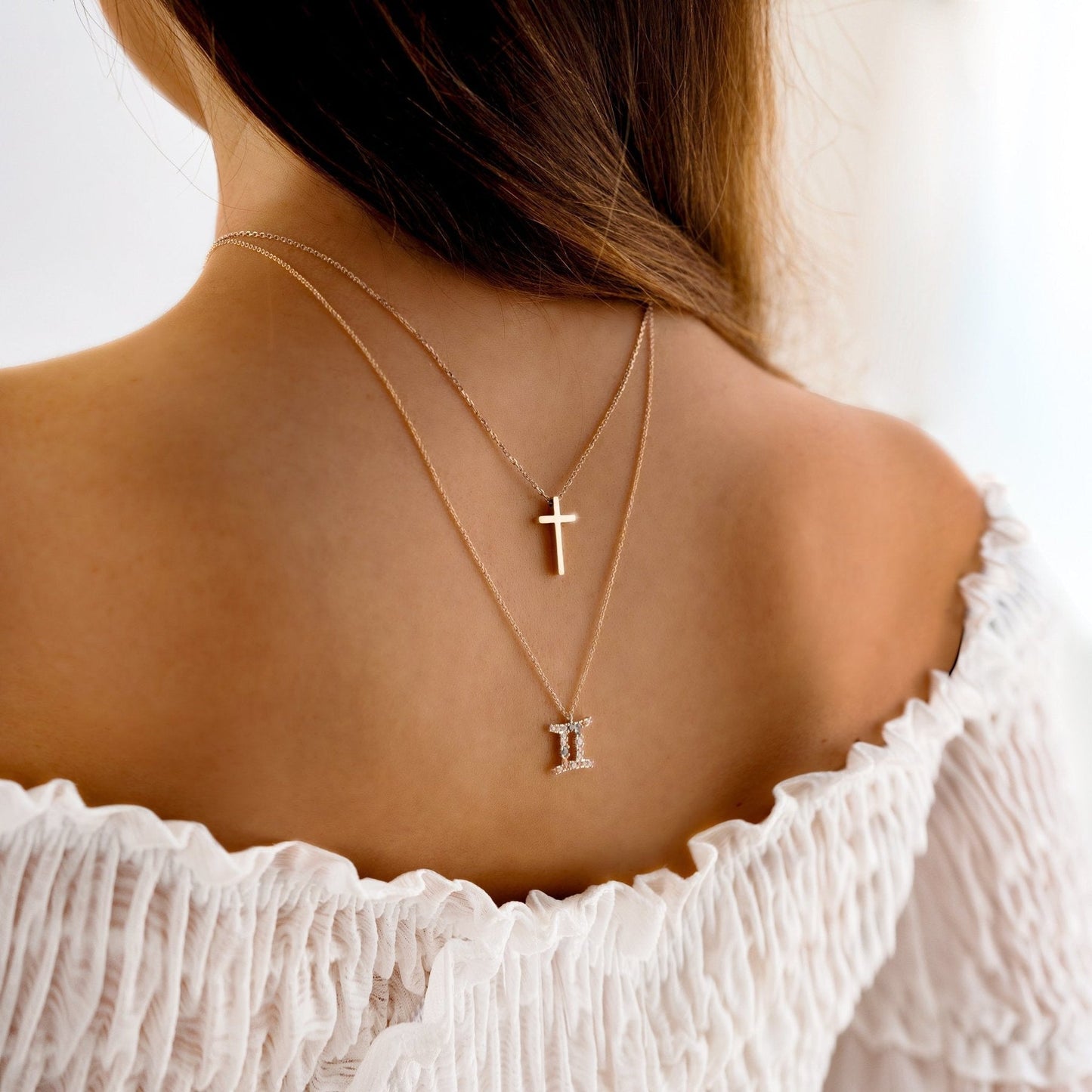 Collier à breloques en forme de croix